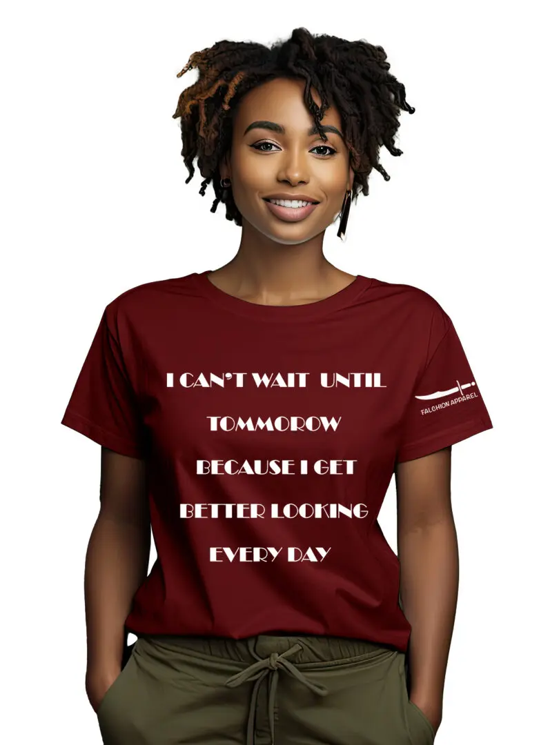 Smiling woman wearing a red t-shirt with a motivational quote.