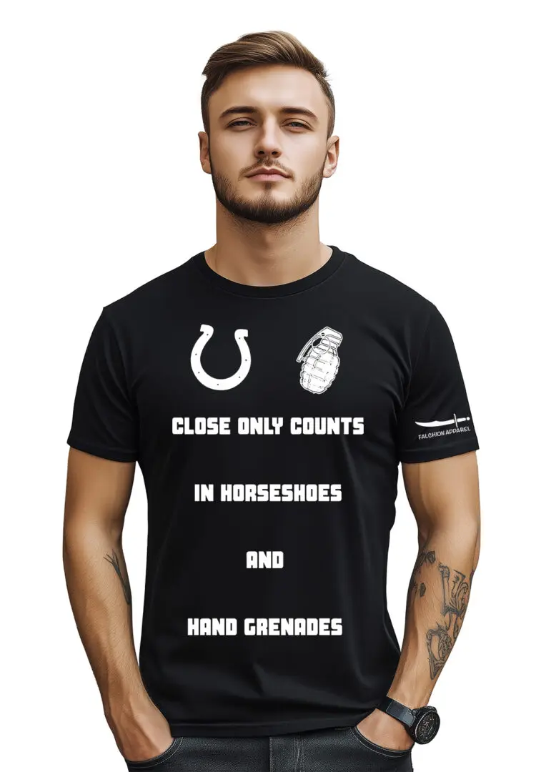 Man wearing a black t-shirt with a sports-themed slogan.